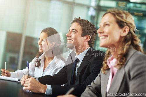 Image of Business, people and presentation with training for learning and a discussion about a collaboration. Group, professional and conference with a smile are planning for teamwork in a business meeting.