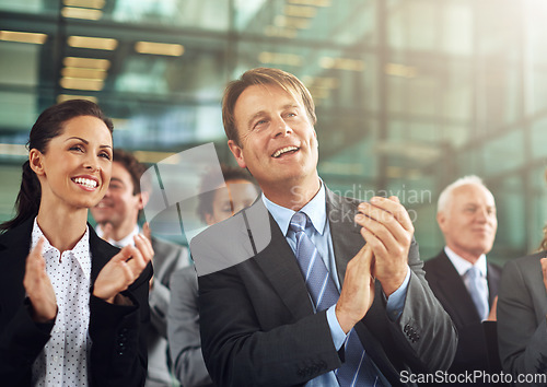 Image of Conference, business and applause with agreement by office team for support and collaboration. Professional, group and seminar with a smile at presentation for growth and success in a company.