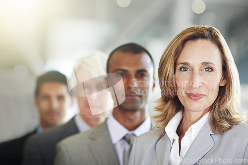 Image of Business woman, portrait and face in leadership, management or diversity at the office. Confident corporate female executive, team or diverse group in teamwork, unity or company vision at workplace