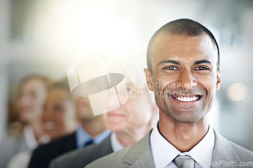 Image of Happy businessman, portrait and face in management, leadership or diversity at office. Confident corporate man executive with smile in diverse group, teamwork or unity for company vision at workplace