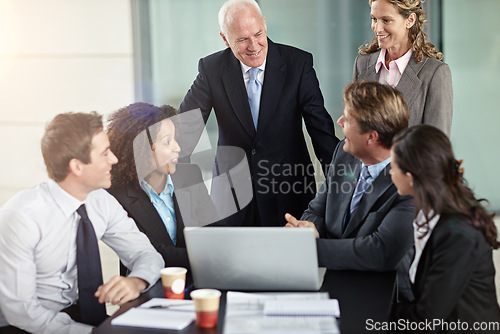 Image of Corporate, ceo with funny joke in business meeting and in office sitting at desk with laptop. communication or planning, cooperation and teamwork or collaboration laughing with coworkers at work