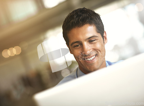 Image of Laptop, happy and business man with online management, career planning and company software or website in bokeh. Smile, feedback and professional person or worker reading news or working on computer