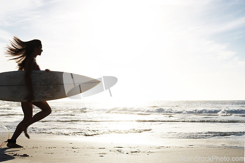 Image of Silhouette, woman surfer run on beach sand and sea, exercise outdoor with surfboard to surf in nature. Sport, shadow and sun with female person running to ocean waves for surfing and mockup space