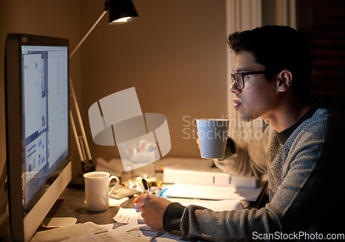 Image of Young, man and student studying at night on a desk computer in a bedroom. College, male and elearning at apartment with coffee to study with technology and the internet for education at university.