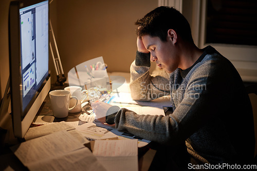 Image of Man, studying and tired in night by computer for test, assessment or stress in college dorm room. Male university student, education and burnout with fear, fatigue and anxiety with books for learning