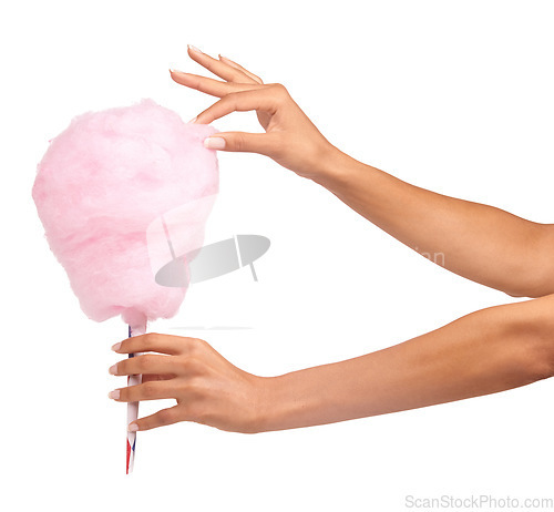 Image of Cotton candy, closeup and woman hands isolated on a white background for sweets, pink food and holiday treat. Person hand holding soft, color cone for youth party, childhood and festival in studio