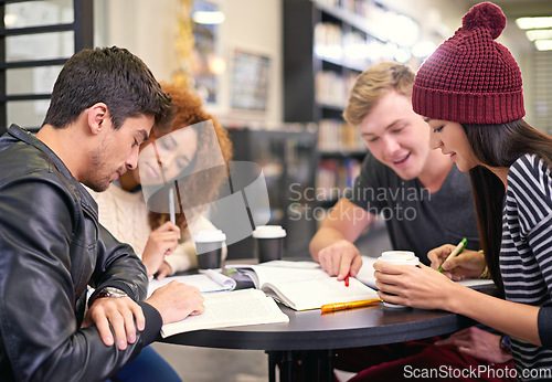 Image of Students study in a group in library, people learning for university education and scholarship. Academic development, knowledge with young men and women studying for exam, research and reading book