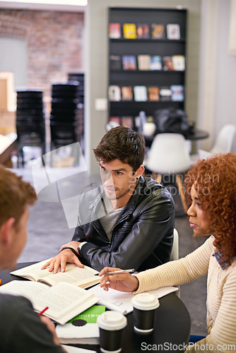 Image of Students studying in a group in library on campus, people learning for university education and scholarship. Academic development, knowledge with men and woman, study with books for research