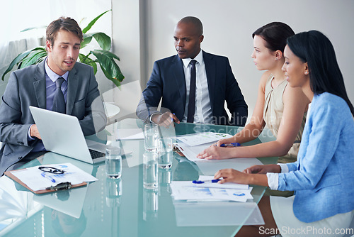 Image of Planning, teamwork and laptop with business people in meeting for idea, documents and learning. Collaboration, data and leadership with employees in office for project management and brainstorming