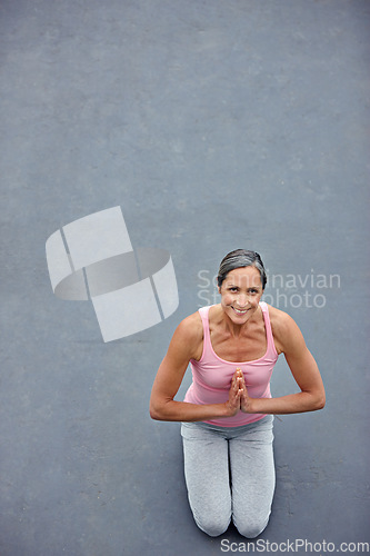 Image of Mockup, yoga and portrait of old woman with praying hands on floor for meditation, healing and balance from above. Mindfulness, prayer pose and space for elderly lady meditating for zen or wellness