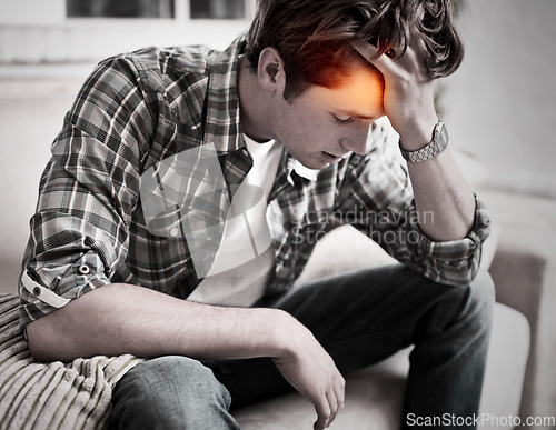 Image of Man, headache and stress on home sofa while depressed, burnout and suffering with mental health or pain. Male person with red glow for fatigue, anxiety and brain fog or mistake while tired on a couch