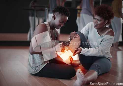 Image of Feet, pain or injury and woman helping friend on floor at fitness studio with burnout or health problem. Female person with exercise partner and red anatomy glow for support, accident and first aid