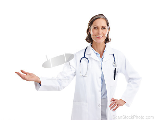 Image of Portrait, woman smile and doctor with palm space in studio isolated on a white background. Healthcare professional, hand mockup and mature person with advertising, marketing or promotion for branding