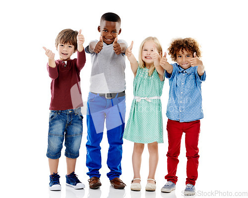 Image of Children, group and together for thumbs up in studio portrait with smile, agreement and white background. Girl, boy or isolated friends for happiness, hand like or solidarity for kids with diversity