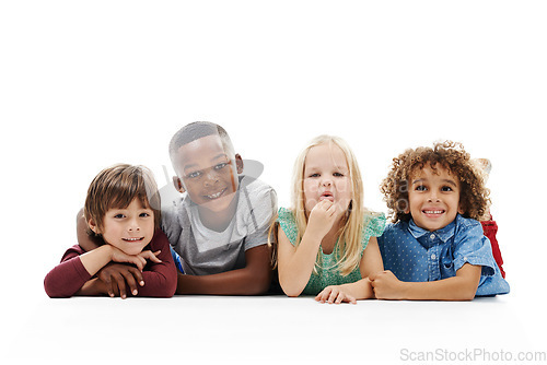 Image of Smile, diversity and children or face on the floor together or against a white background and friends hug. Smile, kids and playful or laughing and isolated in studio or excited buddies and embrace