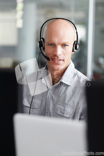 Image of Call center, man and consultant portrait in office communication, tech support and computer software. Face of IT agent, web advisor or person for information technology, helping and customer services