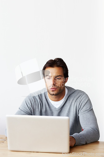 Image of Laptop, research and business man isolated on white background for startup, career planning or web design ideas. Creative, focus and serious person or online user on computer at desk in studio mockup