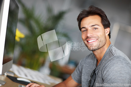 Image of Office, computer and happy man in portrait for creative project, business startup or online planning in career mindset. Face of a graphic designer on desktop pc working and smile for job opportunity