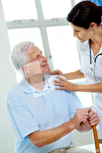 Image of Retirement, woman doctor and old man with cane in hospital, advice and help in support at senior care clinic. Nursing home, healthcare consultation and trust, person with disability on bed with nurse
