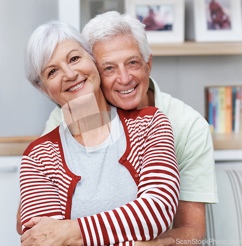 Image of Senior couple, portrait and face with smile, love and care together for quality time at home. Happy elderly man, old woman and embrace in hug for relax retirement, loyalty and support of happiness