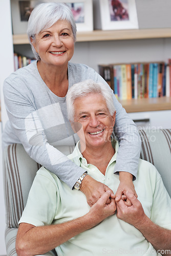 Image of Happy senior couple, portrait and hug for love, romance or embrace in relationship or marriage together at home. Elderly woman hugging man with smile for loving, care and bonding in retirement