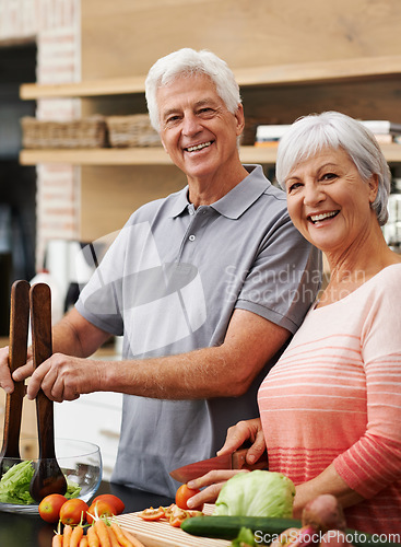 Image of Cooking, salad and portrait of old couple in kitchen for health, love and nutrition. Happy, smile and retirement with senior man and woman cutting vegetables at home for food, dinner and recipe