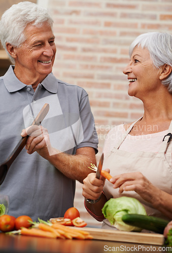 Image of Cooking, health and lunch with old couple in kitchen for salad, love and nutrition. Happy, smile and retirement with senior man and woman cutting vegetables at home for food, dinner and recipe