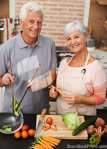 Image of Cooking, health and smile with portrait of old couple in kitchen for salad, love and nutrition. Happy, help and retirement with senior man and woman eating at home for food, dinner and recipe