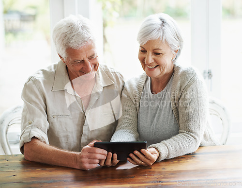 Image of Tablet, happy senior couple and online in house with social media, reading news app and ebook. Retirement, old man and woman with digital technology for subscription, streaming and network connection