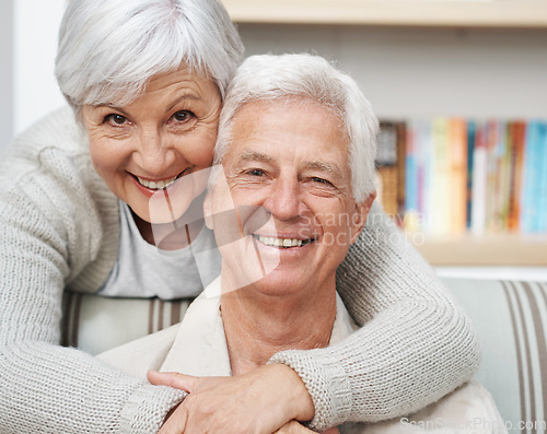 Image of Senior, happy couple and portrait with hug for love, romance or embrace in relationship or marriage at home. Face of elderly woman hugging man with smile for care or bonding together in retirement