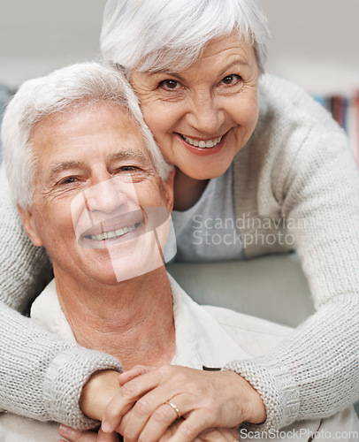 Image of Senior, happy couple and portrait smile with hug for love, romance or embrace in relationship or marriage at home. Elderly woman face hugging man smiling for care or bonding together in retirement