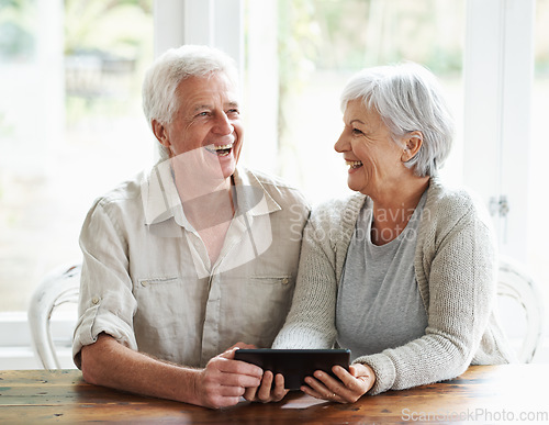 Image of Tablet, senior couple and laughing in home on social media, funny news and online meme. Happy old man, woman and relax with digital technology, subscription and streaming comedy on network connection