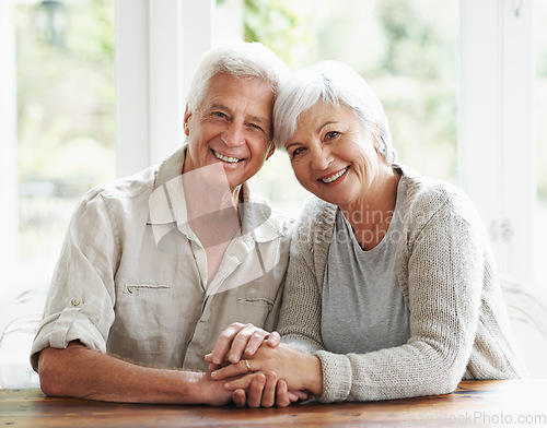 Image of Senior, happy couple and portrait holding hands for love, romance or embrace in relationship or marriage at home. Face of elderly woman and man with smile for care in retirement or bonding together