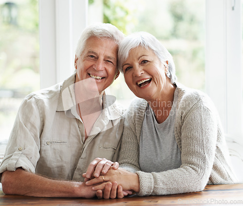 Image of Portrait, laughing and senior couple holding hands for love, care and relax together at home. Face of happy old man, woman and helping hand for trust, support and loyalty to partner in retirement