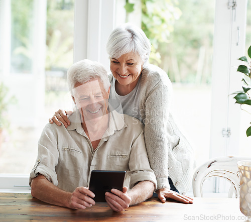 Image of Tablet, happy old couple and online in home with social media, reading news app and ebook. Retirement, senior man and woman with digital technology for subscription, streaming and network connection