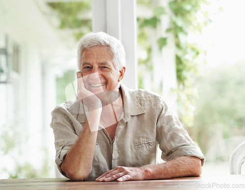 Image of Portrait of senior man, smile and relax in home for retirement and good mood. Face of happy elderly male person on house patio for happiness, confidence and wisdom of ageing, wrinkles or grey hair