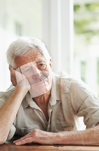 Image of Senior man, lonely and thinking of depression, anxiety and stress of mental health, grief and problems. Depressed, sad and frustrated old guy in doubt, alzheimer and fear of crisis, emotions or worry