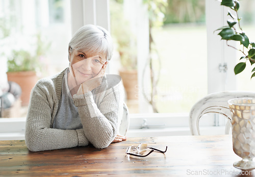 Image of Portrait of senior woman, smile and relax in home for retirement and good mood. Face of happy elderly lady and person in house for happiness, confidence and wisdom of ageing, wrinkles or grey hair