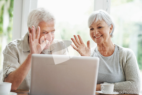 Image of Senior couple, laptop and waving on video call, digital communication and voip connection at home. Happy old man, elderly woman and wave hello on computer for virtual contact, online network and chat