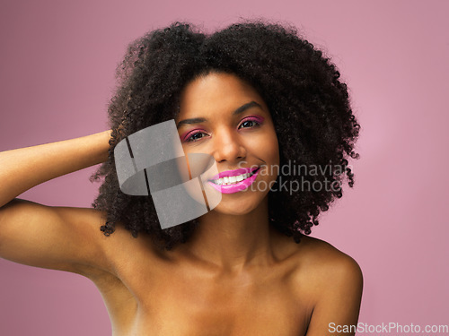 Image of Face, hair care and happy black woman with makeup in studio isolated on a pink background with eyeshadow. Hairstyle portrait, lipstick cosmetics and African female model with salon treatment for afro