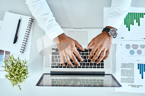 Image of Business man, hands and laptop with documents, data analysis and digital planning, copywriting and seo report. Charts, graphs and stats paperwork of professional person on computer typing from above