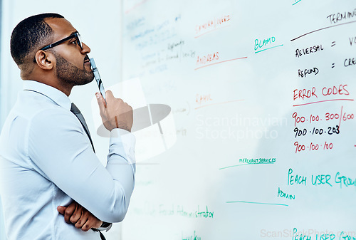 Image of Thinking, planning and business man on whiteboard brainstorming, ideas and numbers or math problem solving. Accountant or African person reading data, accounting solution and finance target on board