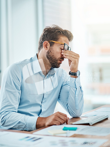 Image of Business man, headache and sick, tired or fatigue in office while working on pc. Burnout, migraine and male person with depression, vertigo or brain fog, anxiety or mental health, stress or problem.