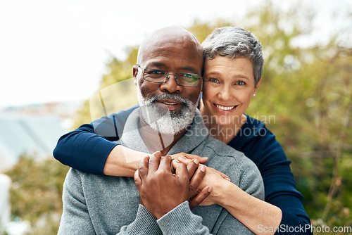 Image of Portrait, hug and senior couple with love, interracial and marriage with happiness, bonding and romance. Face, partners outside or mature woman with elderly black man, embrace and romantic with smile