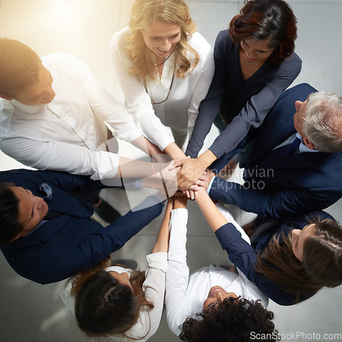 Image of Hands together, support and business people in team with top view, solidarity and trust with professional community. Diversity, collaboration and corporate group in meeting with goals and commitment