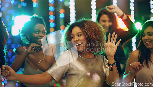 Image of Happy woman, dance and party in nightclub with friends, social event and new year concert. Dancing group, women and disco celebration with music, night life and crowd for energy, smile and happiness