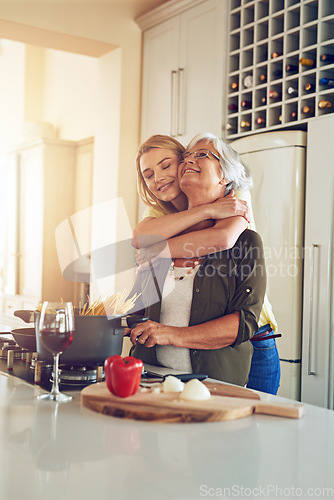 Image of Hug, mom or happy woman cooking food for a healthy vegan diet together with love in family home. Smile, embrace or adult daughter hugging or helping senior mother in house kitchen for lunch or dinner