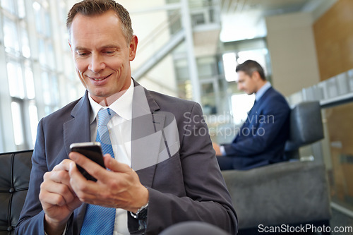 Image of Happy, corporate or business man with phone in office for social media, content research or website review. Manager, accountant or employee with tech for social network, internet or mobile app