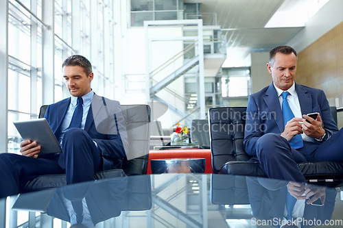 Image of Relax, technology and search with business people in lounge with phone and tablet for contact, internet or email. Search, networking and communication with male employee in lobby of corporate company