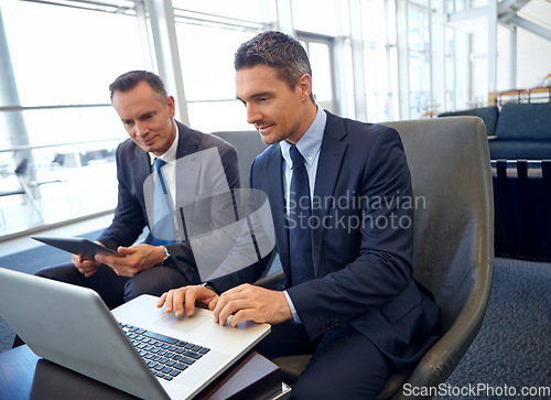 Image of Laptop, planning and business people in corporate lounge review financial portfolio, stock market database or investment. Economy, tablet and trader team work on forex, bitcoin or nft trading